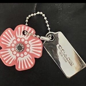 Coach Mini Tea Rose Pink Flower
Charm and Silver-tone Metal Hangtag